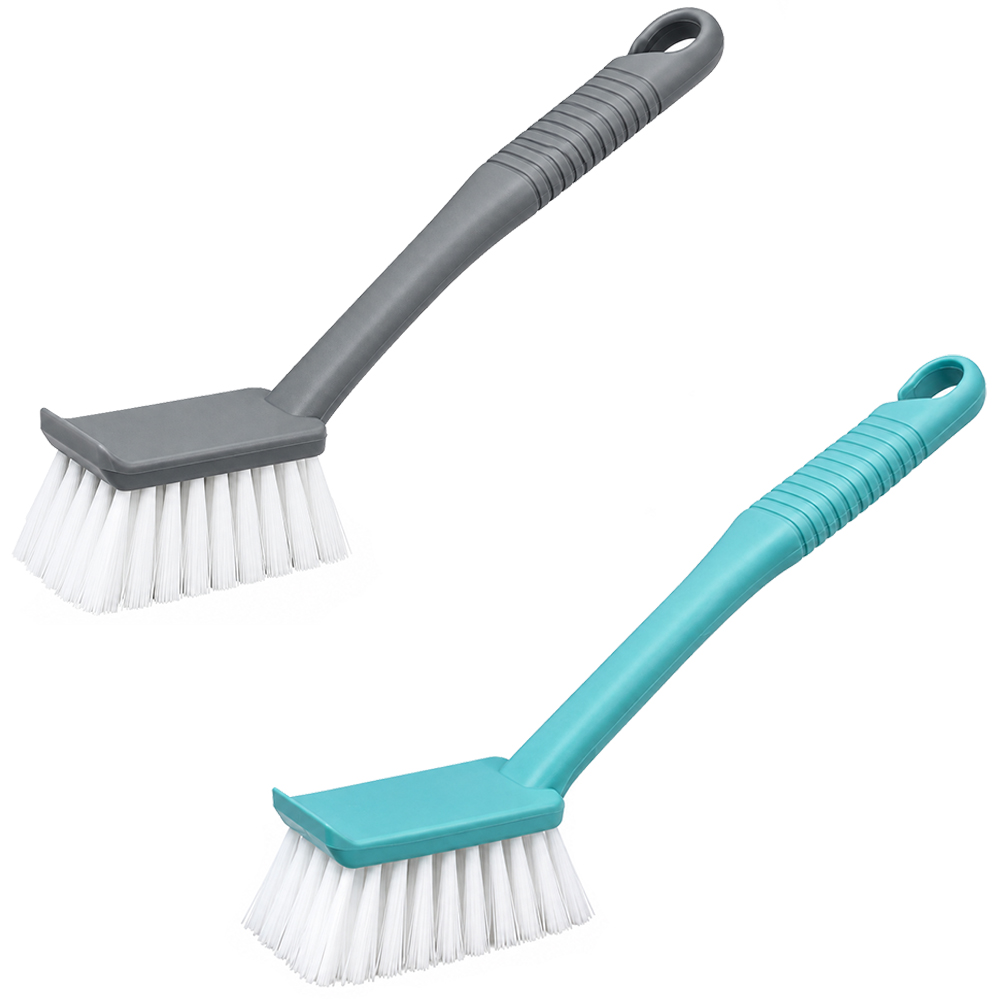 ESCOVA MULTIUSO RETANGULAR COM RASPADOR E CABO PLASTICO 24,5X3CM