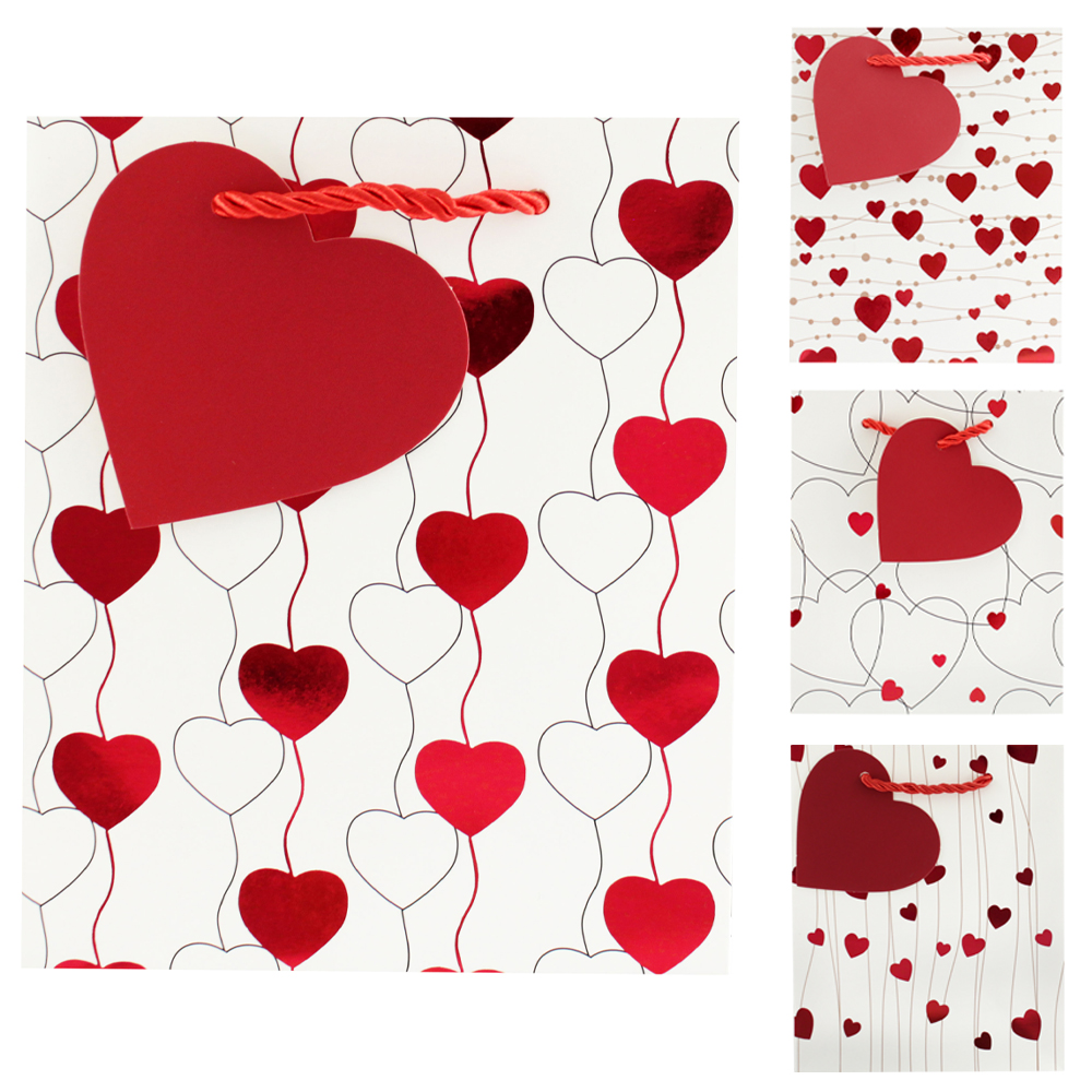 SACOLA DE PAPEL PARA PRESENTE CORACOES VERMELHO 17X14X7CM