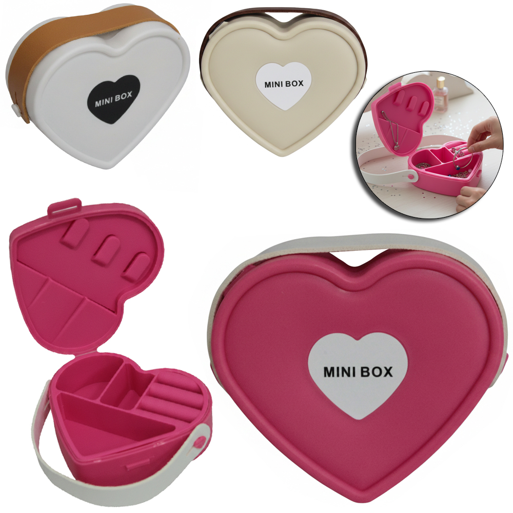 ESTOJO PORTA JOIAS DE PLASTICO / SILICONE CORACAO COM 3 DIVISORIAS E ALCA 10,5X9,5X4CM